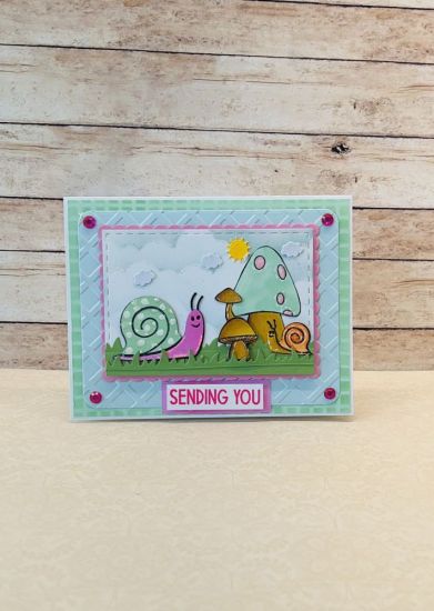 Snails2stamp 
Snails2stamp & dies. More snails, mushrooms2stamo & dies, grass border dies, hexagon & cloud stencil, lattice background dies used to emboss, scalloped dies, clouds from tri die, rhinestones and 3�d inks
