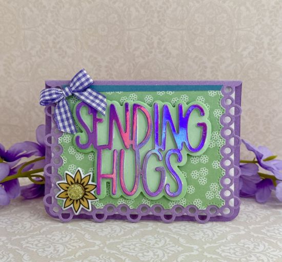 August 2025 Sending Hugs card Kit
The Sending Hugs paper is actually TSOL purple paper. It changes colors from the camera light. 
