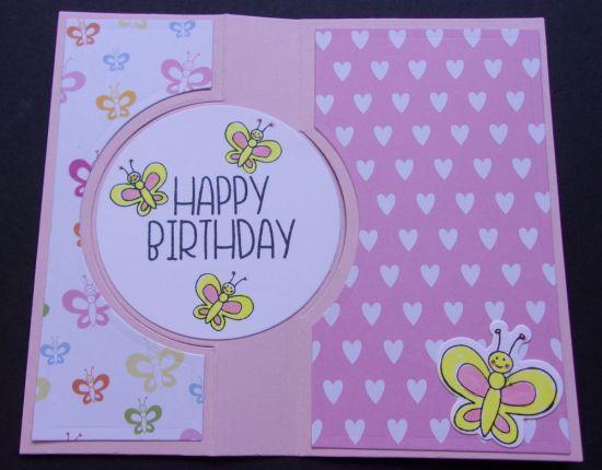 Flip-it card opened.  Used butterfly2stamp and patterned papers.
