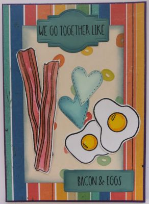 We go together like...Bacon and Eggs (Of course!)
Not only do I think these bacon and eggs go together, I think they're in love! I added hearts because Valentine's Day is fresh on my mind being less than a month away. Both bacon and eggs were stamped with StazOn black ink and then colored in with watercolor paints. 
Keywords: bacon eggs love
