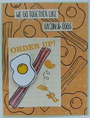 Making your own background matching paper by using the stamps
This card only uses one of each bacon strip and egg. The orange background paper was made by stamping the four bacon & eggs stamps randomly. It's a great way to make matching paper to tie it all in. The fried egg's yolk is popped up using a foam adhesive dot.
Keywords: bacon egg 