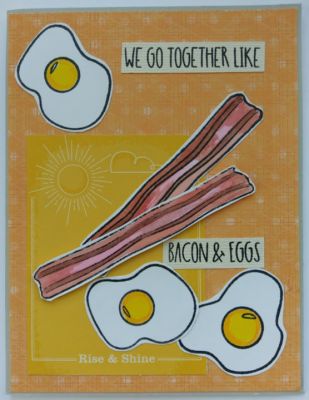 This yellow and orange colored card uses complimentary coloring to the bacon and eggs in this set.
Using yellow and orange reminds me of sunshine. Bacon and eggs, remind me of breakfast...in the morning sunshine. I thought they went together so well. Background papers are unlimited in what you can use to match the images and sayings of this set. I've posted prior picks using similar designs with these same colored bacon and eggs. It's because I've made so many various designs with this same club kit set. I do think each card does end up with it's own unique look.
Keywords: bacon eggs