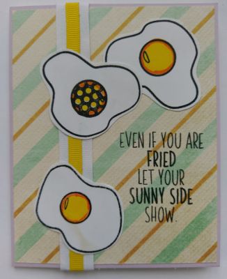 Even if you are fried, let your sunny side show
Designing this card using one of the circular yolk center stamps made it appropriate for the sentiment of showing your sunny side. That one fried egg stands out from the other two. 
Keywords: eggs