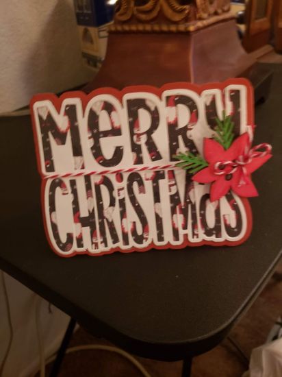 Merry Christmas 
Merry Christmas Fold it dies and baker twine and wood tree from diamond press and paint from spectrum noir acrylic pen set (red and green)
Keywords: Merry Christmas
