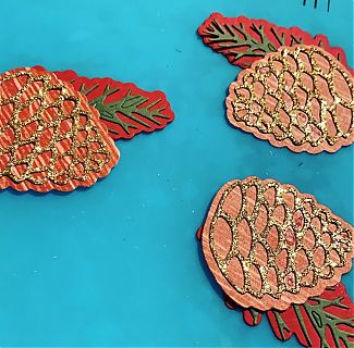 pine_cones_on_craft_mat.jpg
