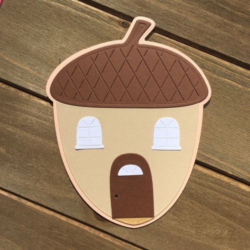 Acorn House 
I used the Acorn Fold-It die to create this cute acorn shaped house. The door and windows I made were done by using the Gingerbread House Fold-It
