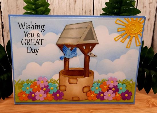 Wishing well
Keywords: Cloud border birdbath wheelbarrow sun