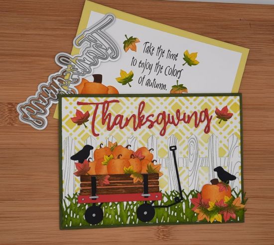 Thanksgiving
Keywords: Thanksgiving fence wagon pumpkins sign l eaves crow