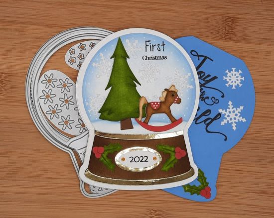 Snowglobe Fold It
Keywords: Snowglobe tree snowflakes rocking horse Christmas