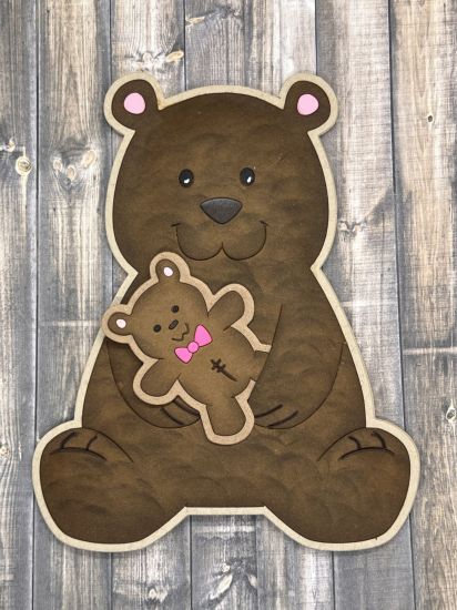 It�s a Girl!
I stuffed the bear with poly-fil to give it character.   It�s hard to tell in the picture. 
