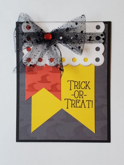 Halloween Card with Big Eyelet Rectangle Die
Using some stamps from the critters4Halloween stamp set I essentially made my own patterned paper. Black tulle was used to make a bow. Clear jewel colored orange with an alcohol marker. 
Keywords: critters4Halloween Big Eyelet Rectangle Dies
