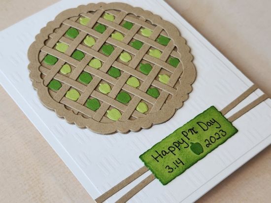 PI Day (Pie Day) side view
Different view of a fun pie created with deckle edge nesting circles. (Fun fact: the lattice lines were cut using the stripe die from the 5x7 Stripe Card Die set)
Keywords: pie apples deckle edge nesting circles cross hatch stencil 5x7 stripe card die set