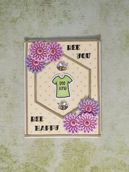 Bee Kind spinner card
Flowers from the 5x7 Stripe Card set to decorate an A2 card. The Bee Kind sentiment & bees from the bumblebee2stamp set, shirt from the tshirt2stamp set. Gingersnap strips, cut from the striped die in the 5x7 set used to decorate the card. 
Keywords: bee sentiments flowers