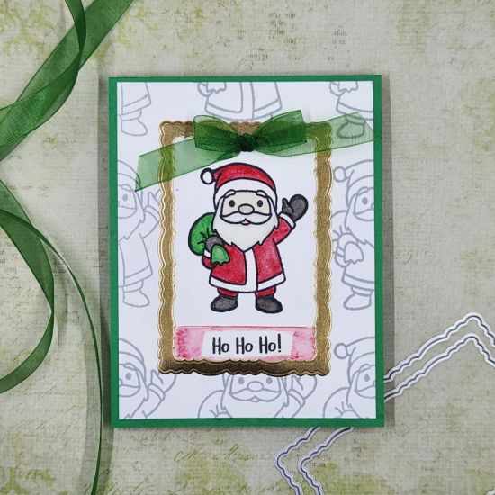 Ho Ho Ho! 
Using the main Santa stamp, I stamped him all over the background and then colored the center one so it stands out. A frame was made using 2 rectangles from the Deckle Edge shaped dies out of gold foil paper. Sentiment and bow added to finish off the card.
Keywords: Happysanta2stamp deckle edge shapes dies
