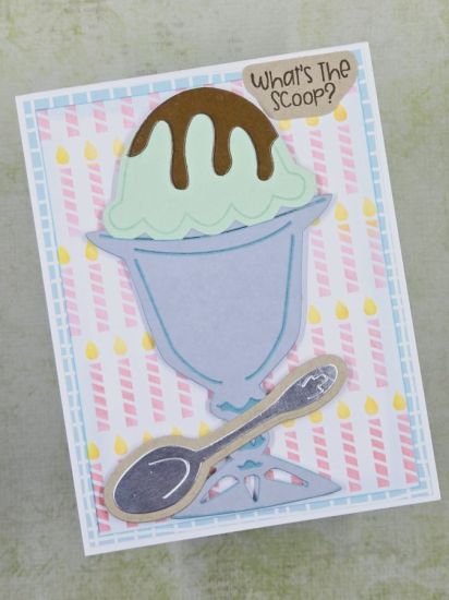 What's the Scoop?
A birthday card featuring a scoop of mint ice cream with chocolate sauce on top. The background features the candle stencil from the April 2024 Fold-It Club: Birthday Dog
Keywords: sundae2stamp Birthday Dog Fold-It hotchocolate2stamp dies