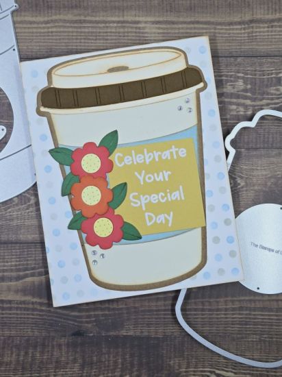 Celebrate
The birthday card I made for my Mom using the Coffee Cup Fold-it and the Picnic Basket Fold-it for the flowers. The sentiment sticker is one that I received as a gift from a card kit. 
Keywords: Coffee Cup Fold-it Picnic Basket Fold-it