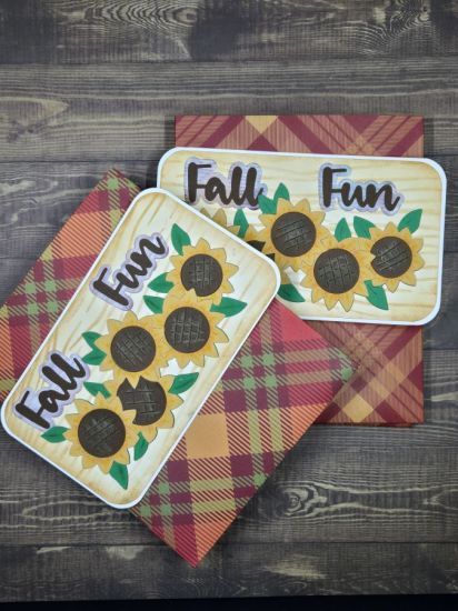 Fall Fun
A mini slimline card with rounded corners. This card was inspired by one done by Chris Lawlor using the same sunflowers from the Garden Fence Fold-It). Fall and Fun dies from different TSOL sets/kits. Woodgrain stencil also part of the Fold-It Club.
Keywords: Garden Fence Fold-it