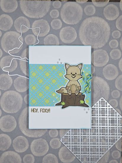 Hey, Foxy!
Using the paper pad from the November 2022 card kit, I used the dies from the Woodland2stamp die set to cut out the fox and tree stump. Also, I used the decorative background plaid die from the Mini A1 Tri-Fold Card Base Die set that originally came in the November 2022 card kit.
Keywords: Mini A1 Tri-Fold Card Base Die Set Woodland2stamp