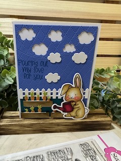 Keywords: bunny watering can carrots