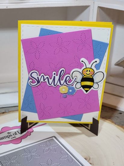 Keywords: smile, stitched flower