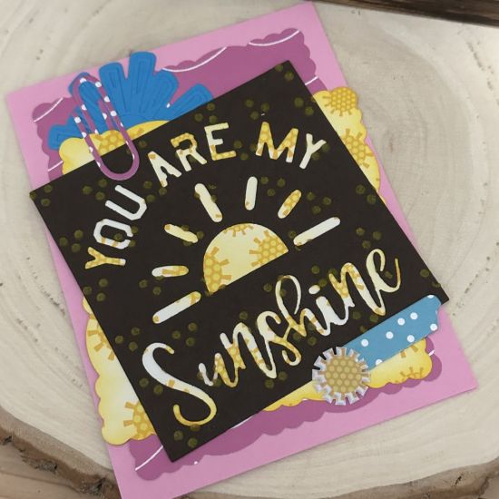 Keywords: Sunshine paperclip deckle edge sun