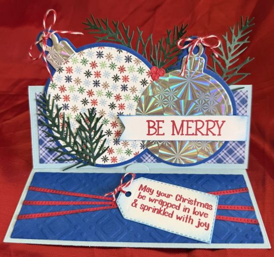 A2 stand up with A1 ornaments
A stand up card with the A1 ornaments fold it. 
Keywords: Christmas ornaments September2025CardKit FauxTwine TagDies