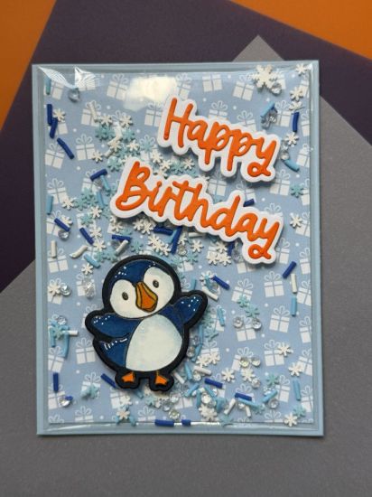 Puffin birthday Shake it
Birthday card front shake-it with a puffin and the little shake it bits that came in the card kit. Birthday Vibes paper pad. 
Keywords: puffin birthday shakeit