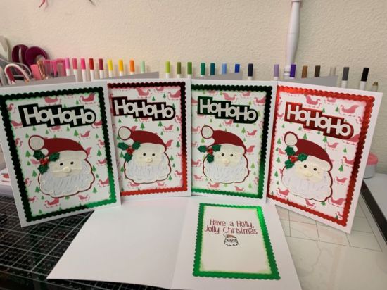 Christmas Cards
I used the Santa2Stamp and Die set; HoHoHo sentiment die; and 5x7 Scallop frame dies.  Colors used were Evergreen; Cranberry; bubblegum, vanilla, powder sugar and licorice.
Keywords: Santa; Christmas; HoHoHo; Scallop;