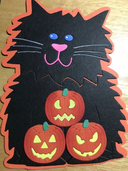 Cat Fold It - Halloween 
Cat fold it card with some pumpkins on the bottom…
Black and orange colors.
