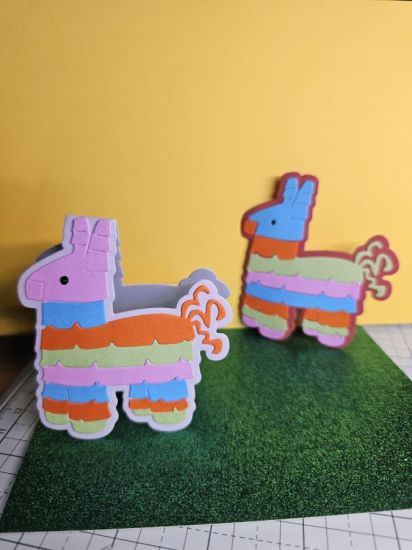 Pinata 1
Made a Mini fold it Pinata and a regular die cut pinata from the Pinata stamps and die set.  
Keywords: Mini Fold it