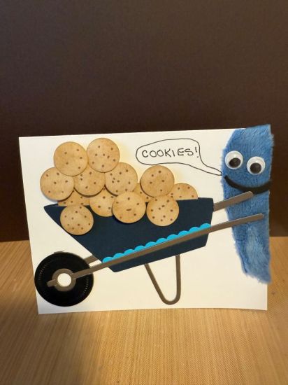 Cookies!
Cookie Monster pushing a wheelbarrow of cookies
